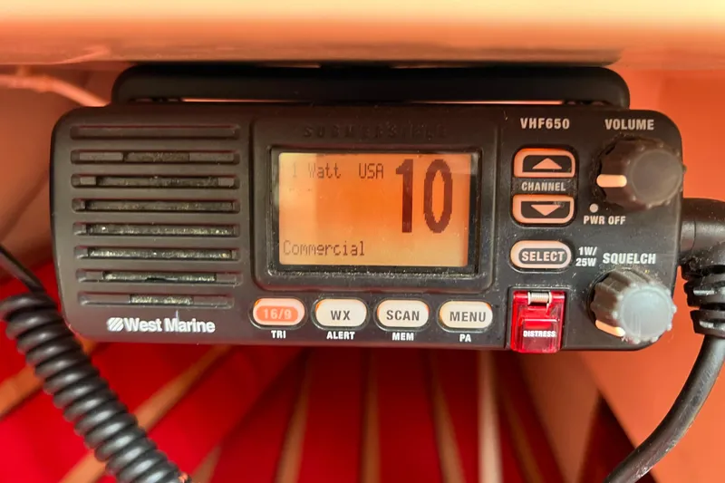 Slide: The Image of West Marine VHF650 radio on 1985 Catalina 27 sailboat, displaying channel 10. - 29