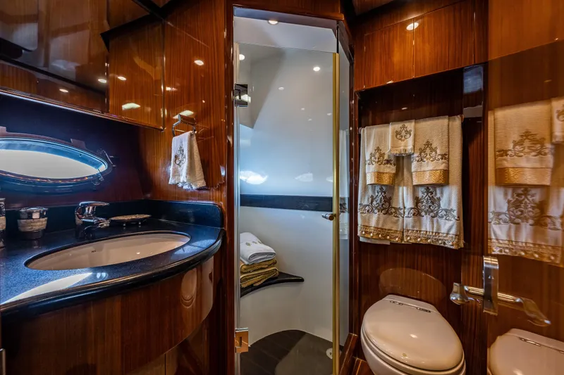 Slide: The Image of Luxurious bathroom in 2009 Ocean Alexander 52 Sedan yacht with elegant wood finishes. - 34