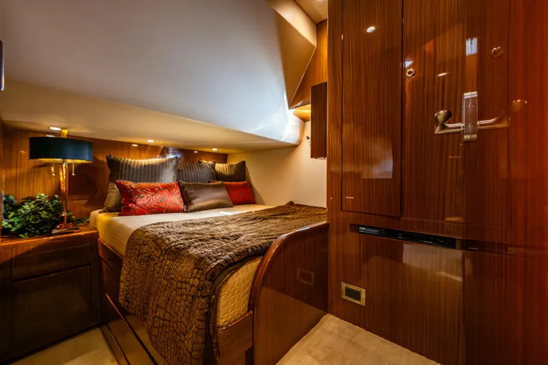 Slide: The Image of Luxurious cabin interior of 2009 Ocean Alexander 52 Sedan yacht, featuring elegant wood finishes. - 35