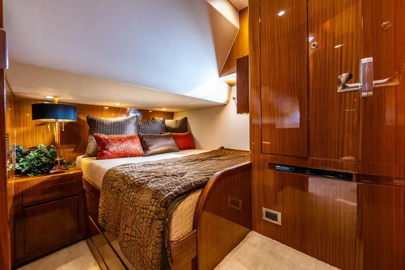 Slide: The Image of Luxurious cabin interior of 2009 Ocean Alexander 52 Sedan yacht, featuring elegant wood finishes. - 40