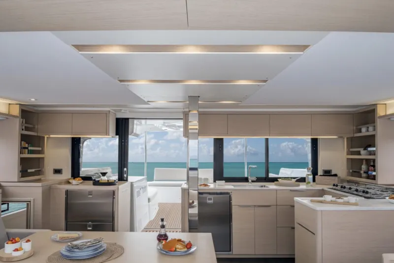 Slide: The Image of Luxurious kitchen interior of 2026 Lagoon 46 ICONIC yacht with ocean view. - 9