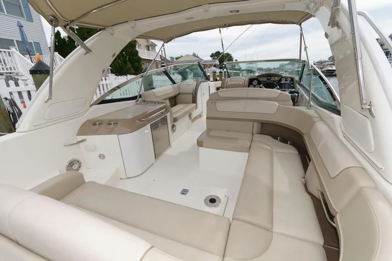 Slide: The Image of 2014 Formula 350 Crossover Bowrider with spacious seating and modern interior design. - 2