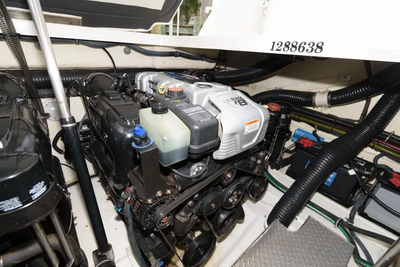 Slide: The Image of Engine compartment of a 2014 Formula 350 Crossover Bowrider boat. - 21