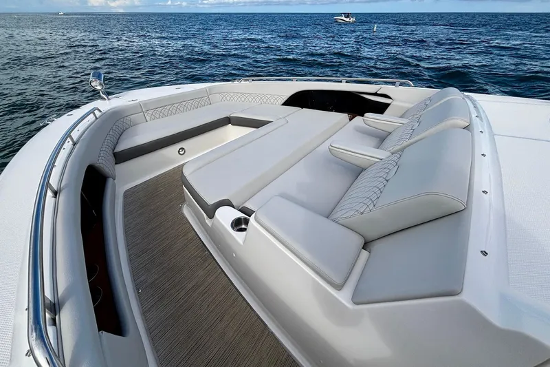 Slide: The Image of 2022 Sea Ray Sundancer 370 Outboard with luxurious seating on open water. - 24