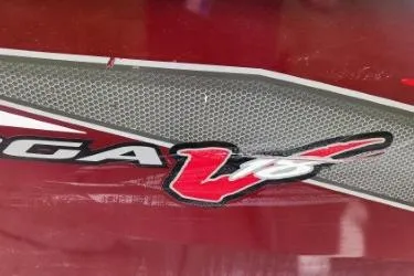 Slide: The Image of 2018 Tracker Targa V-18 Combo logo on a red background. - 12