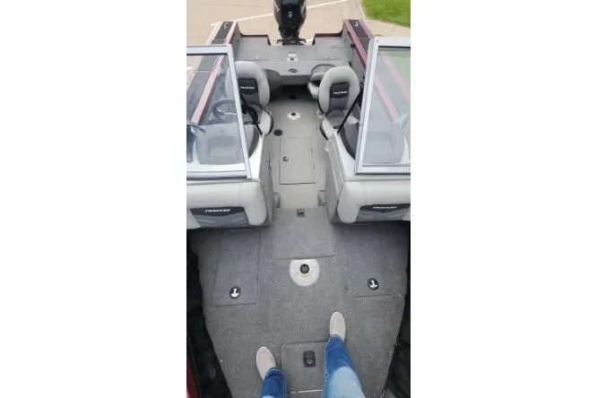 Slide: The Image of 2018 Tracker Targa V-18 Combo boat interior with seating and windshield view. - 14
