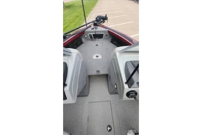 Slide: The Image of 2018 Tracker Targa V-18 Combo boat interior with fishing rod holder. - 16