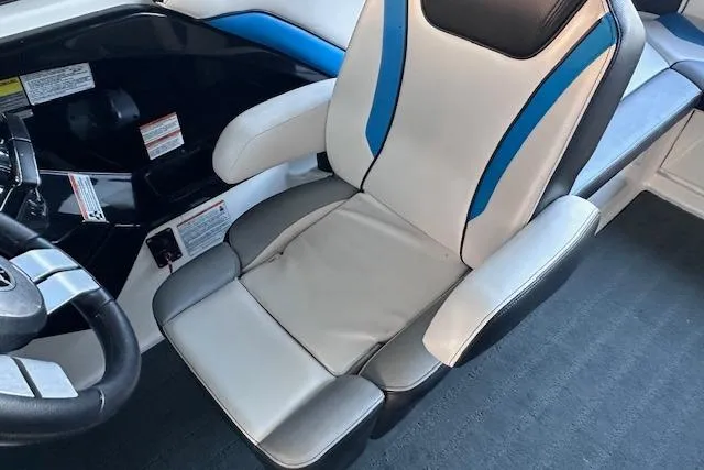 Slide: The Image of 2016 Yamaha Boats 242X E-Series dashboard with steering wheel and control panel. - 19