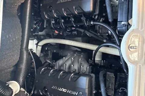 Slide: The Image of Storage compartment in 2016 Yamaha Boats 242X E-Series with life jackets and gear. - 21