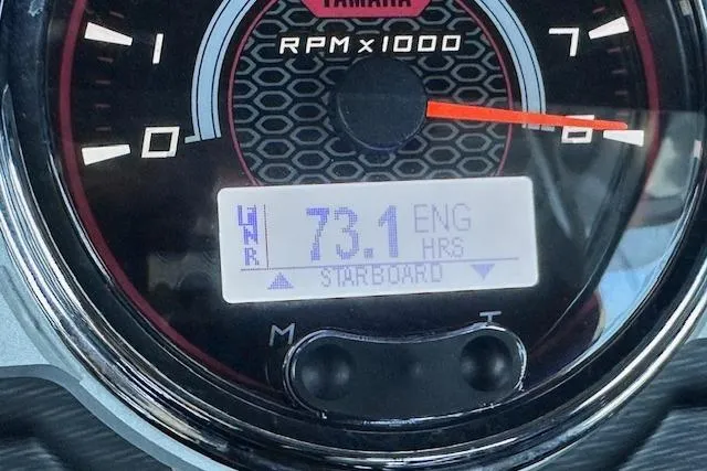 Slide: The Image of Yamaha Boats 2016 242X E-Series tachometer displaying 73.1 engine hours on starboard. - 28