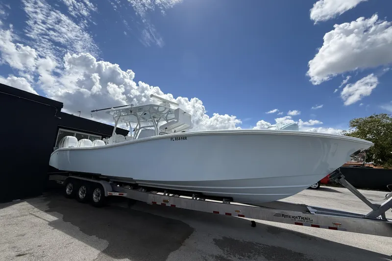 Slide: The Image of 2021 Yellowfin 36 Offshore boat on trailer under blue sky. - 3