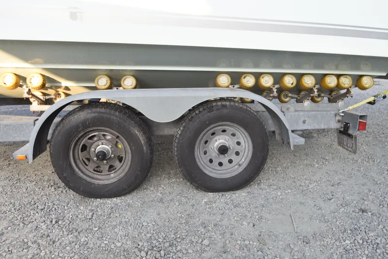 Slide: The Image of Trailer with dual wheels for 2005 Regulator 24 Forward Seating boat. - 8