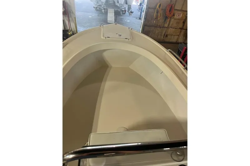 Slide: The Image of 2009 Parker 2100 Special Edition boat interior in a garage setting. - 5