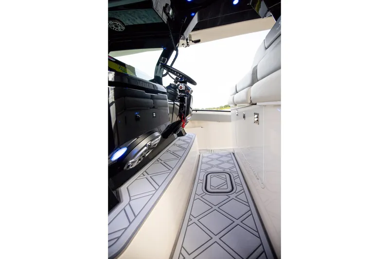 Slide: The Image of 2024 Scout 377 LXF boat interior with modern seating and sleek design. - 41