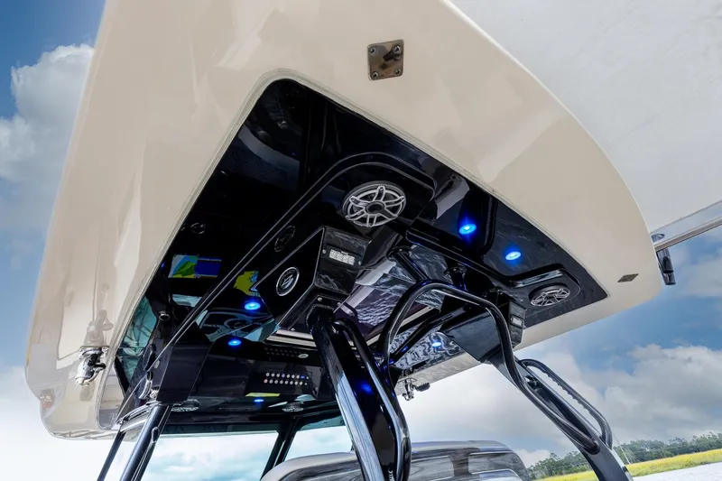 Slide: The Image of 2024 Scout 377 LXF boat interior with modern lighting and audio system. - 64