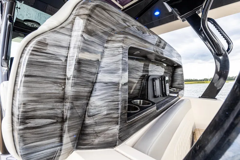 Slide: The Image of 2024 Scout 377 LXF Custom Paint Upgrade on back of Helm Seat plus Cell Phone Charging Docks (2) - 65