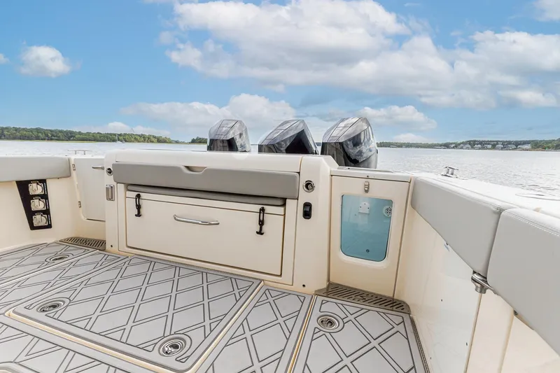 Slide: The Image of 2024 Scout 377 LXF boat deck with Summer Kitchen Upgrade/Slide Out Cooler/Seat - 8