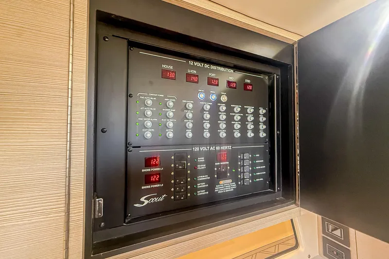 Slide: The Image of Electrical control panel of 2024 Scout 377 LXF boat, showcasing power distribution. - 87