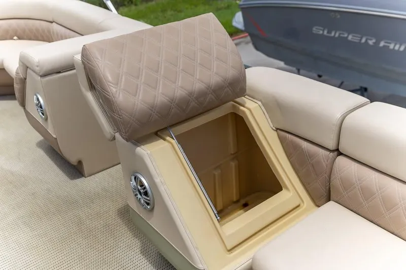 Slide: The Image of Luxurious seating on 2022 Massimo Marine P-23 MAX Limited boat, featuring storage compartment. - 12