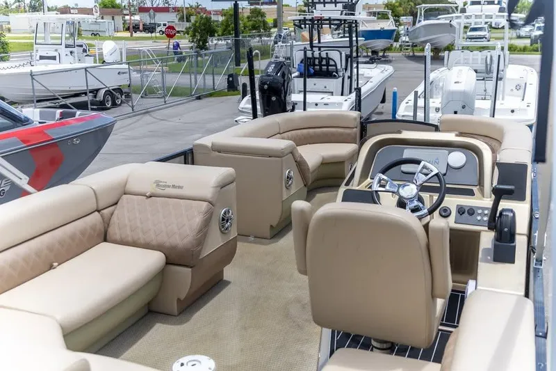 Slide: The Image of 2022 Massimo Marine P-23 MAX Limited pontoon boat with luxurious seating and modern helm. - 5