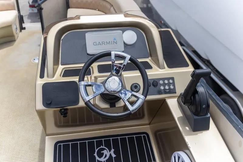 Slide: The Image of Steering console of 2022 Massimo Marine P-23 MAX Limited with Garmin navigation system. - 7