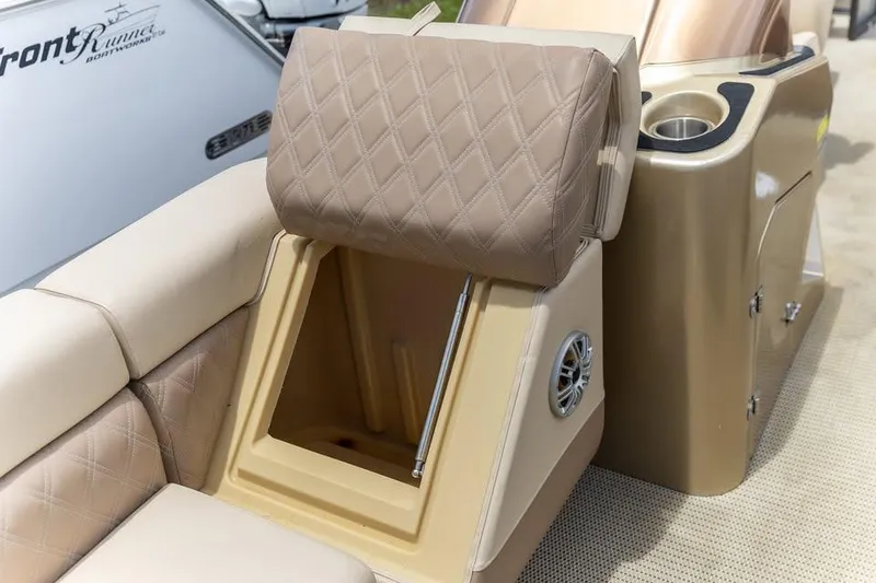 Slide: The Image of Luxurious seating on 2022 Massimo Marine P-23 MAX Limited boat, featuring beige upholstery and storage. - 8