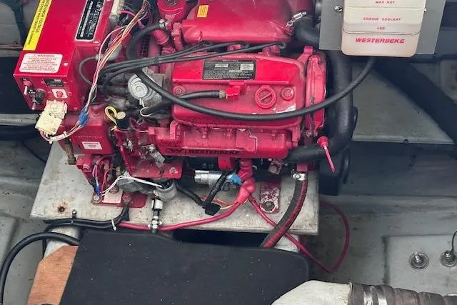 Slide: The Image of Red Westerbeke engine in 1994 Mainship 40 Sedan Bridge boat. - 32