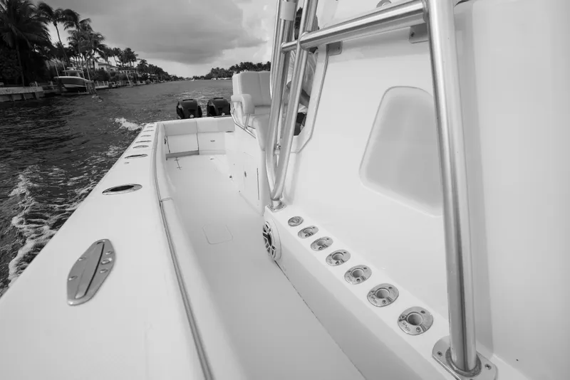 Slide: The Image of Engine compartment of a 2015 SeaVee 39Z boat, showcasing filters and hoses. - 22