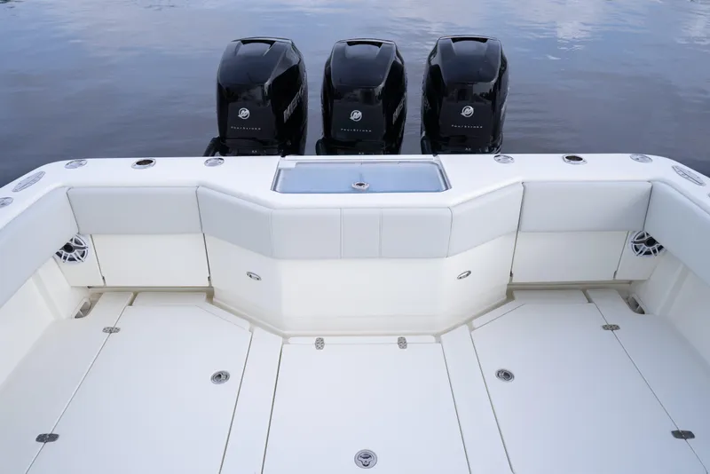 Slide: The Image of Open storage compartment on 2015 SeaVee 39Z boat with various items inside. - 31