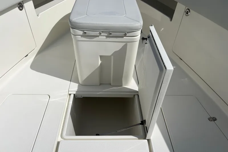 Slide: The Image of Engine compartment of 2015 SeaVee 39Z boat, showcasing hoses and filters. - 41