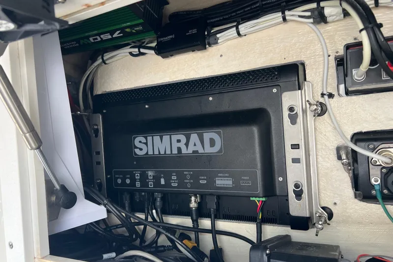 Slide: The Image of Open storage compartment on a 2015 SeaVee 39Z boat deck. - 48