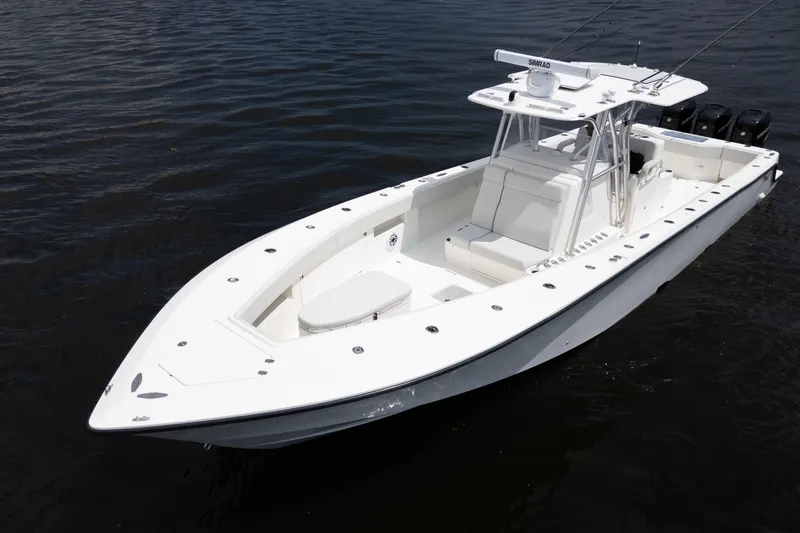 Slide: The Image of 2015 SeaVee 39Z boat interior showing control panel and storage area with rain gear. - 51