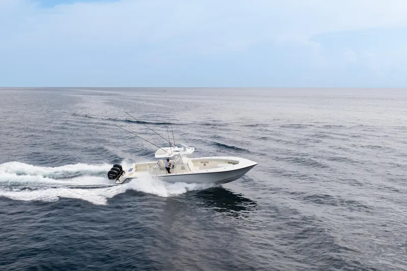 Slide: The Image of 2015 SeaVee 39Z boat cruising on open ocean waters. - 8