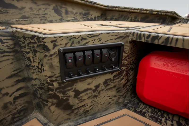 Slide: The Image of 2026 Tracker Grizzly 1650 T Prairie Wings Edition with camouflage design detail. - 18