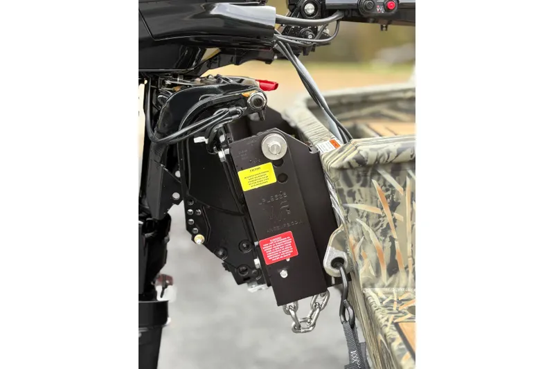 Slide: The Image of 2026 Tracker Grizzly 1650 T Prairie Wings Edition boat motor detail. - 31