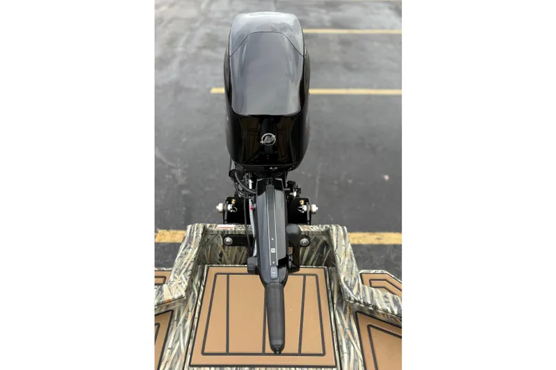 Slide: The Image of 2026 Tracker Grizzly 1650 T Prairie Wings Edition boat motor, rear view. - 33
