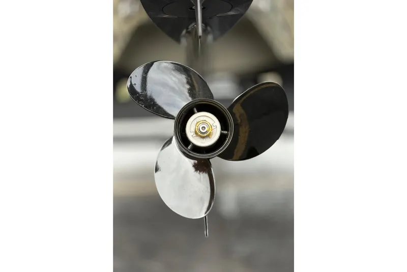 Slide: The Image of Close-up of a Tracker Grizzly 1650 T Prairie Wings Edition 2026 boat propeller. - 35