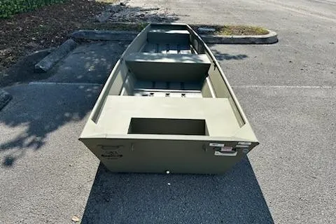 Slide: The Image of 2026 Tracker Grizzly 14 Jon boat in a parking lot, showcasing its sturdy design. - 3