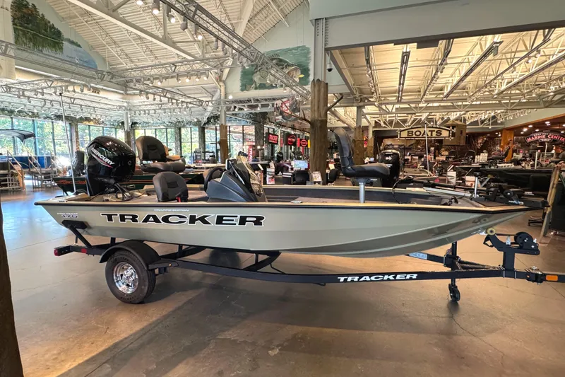 The Image of 2026 Tracker Pro Team 175 Crappie Edition boat displayed in a showroom. - 0