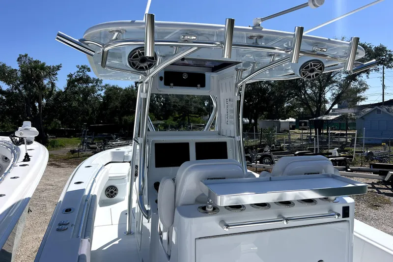 Slide: The Image of 2026 Contender 32 ST boat interior with advanced navigation and fishing equipment. - 13