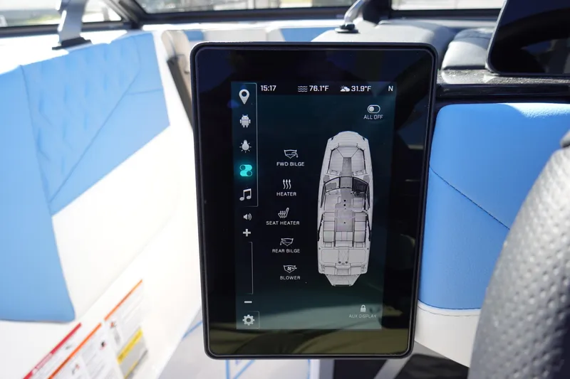 Slide: The Image of Touchscreen control panel in 2025 Malibu M230 boat, displaying various onboard functions. - 15