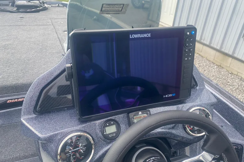 Slide: The Image of Dashboard of a 2026 Phoenix 21 XE boat with Lowrance HDS12 display. - 14