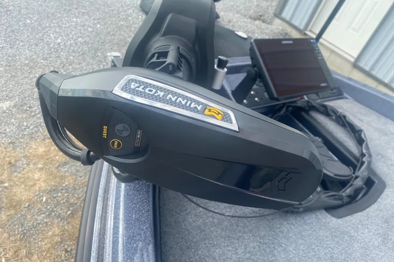 Slide: The Image of Minn Kota motor on 2026 Phoenix 21 XE boat, featuring advanced control panel. - 25