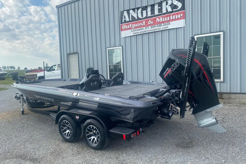 Slide: The Image of 2026 Phoenix 21 XE boat at Anglers Outpost & Marine dealership. - 6