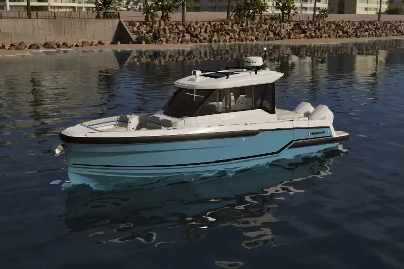 The Image of 2026 Wellcraft 28 Explorer boat on calm water, near a rocky shoreline. - 0