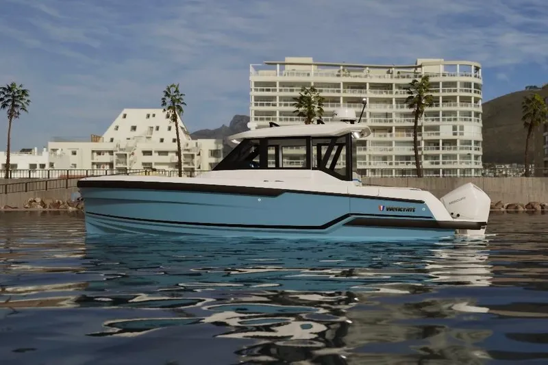 Slide: The Image of Interior of 2026 Wellcraft 28 Explorer boat, featuring modern seating and sleek design. - 11