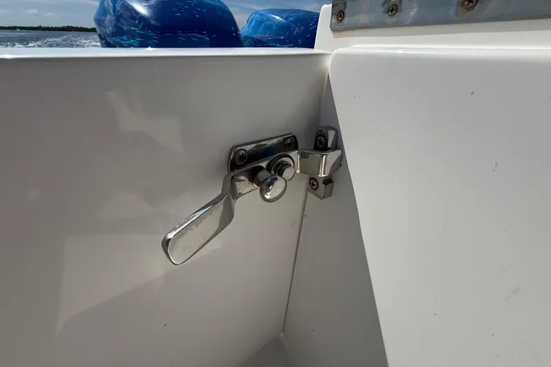 Slide: The Image of Stainless steel latch on 2001 Regulator 32 Center Console boat. - 21
