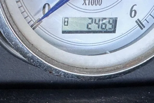 Slide: The Image of Close-up of a 2004 Four Winns 210 Horizon SS tachometer displaying 246.9 hours. - 12