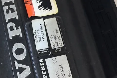 Slide: The Image of Close-up of Volvo Penta engine labels on a 2004 Four Winns 210 Horizon SS boat. - 16
