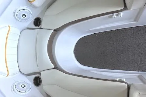 Slide: The Image of Interior of 2004 Four Winns 210 Horizon SS boat with beige seating and carpeted floor. - 8